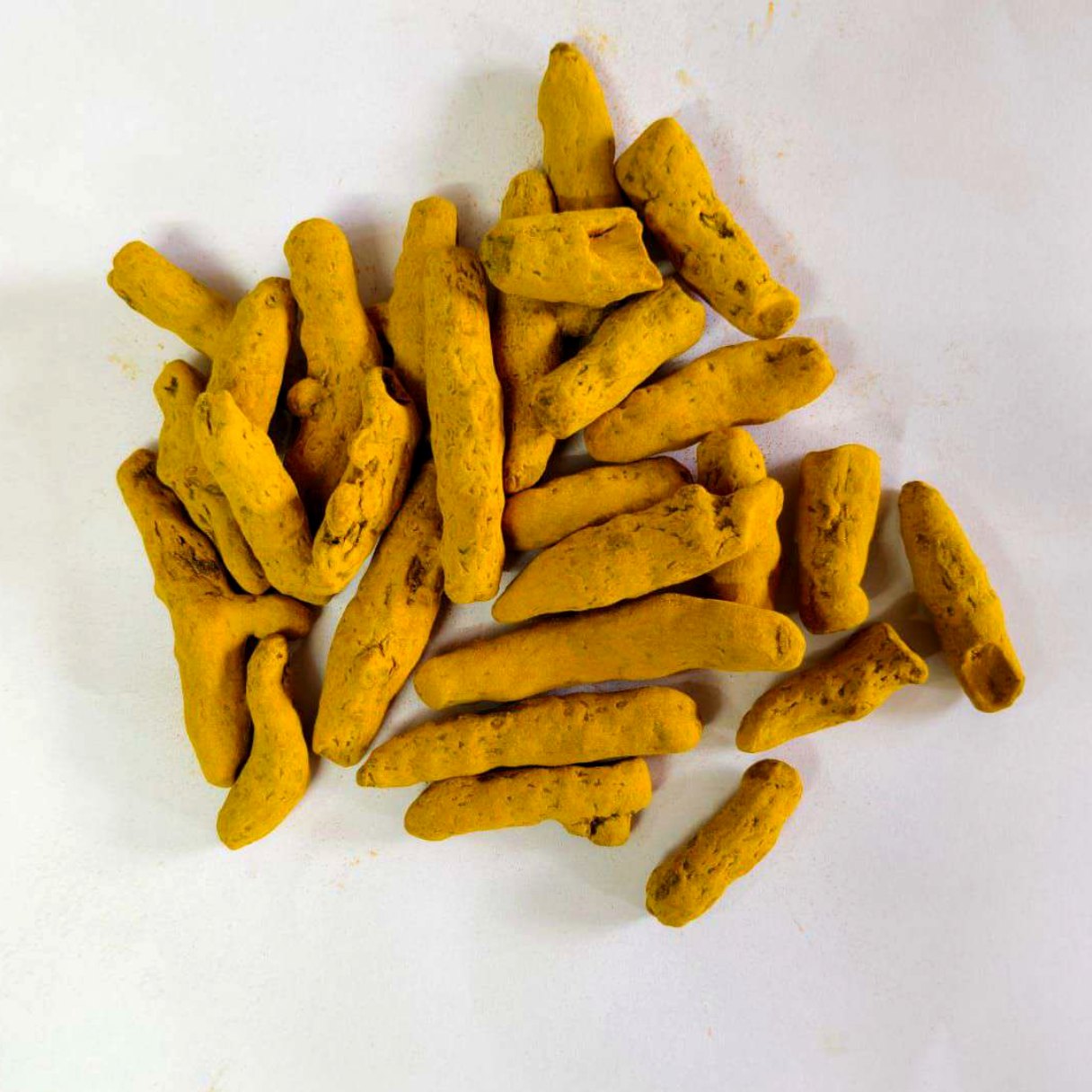 Whole turmeric - polished, cured fingers Whole dried turmeric fingers graded for bulk export by MKB Enterprises